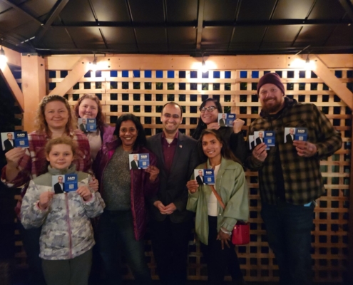 Volunteers meet at Common Fields on the patio